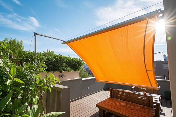 Home terrace rain curtains providing protection from rain while maintaining visibility