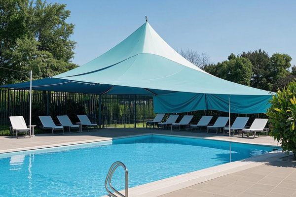 Pool area rain covers protecting poolside furniture and creating sheltered spaces