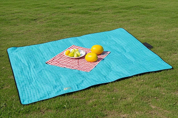 Waterproof picnic mat with durable bottom layer for outdoor use