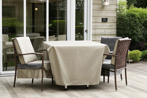 Oxford fabric covers for tables and chairs in both indoor and outdoor settings