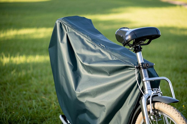 Oxford fabric bicycle cover protecting a bike from dust and moisture