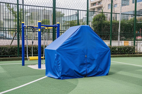 Oxford fabric covers protecting outdoor fitness equipment from weather elements