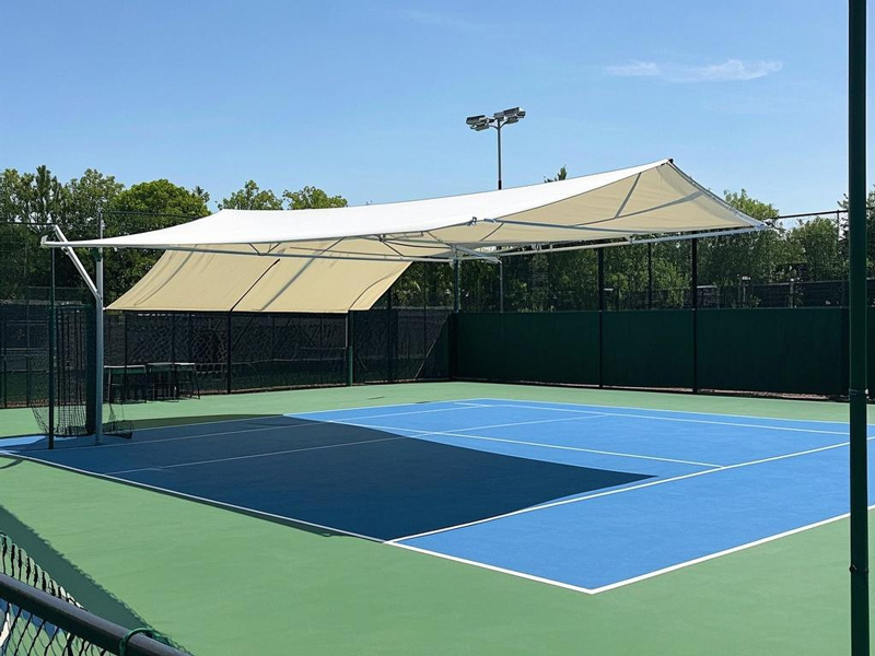 PT fabric sunshade canopies installed at tennis court and swimming pool area