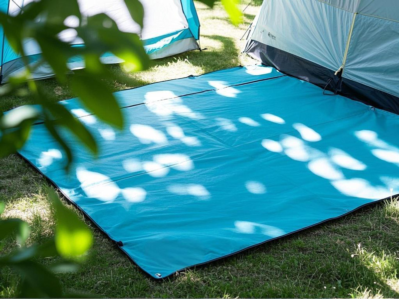 Lightweight PT fabric waterproof groundsheets used in camping site setup