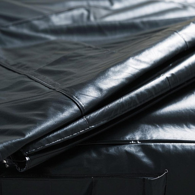 Tarp being secured with ropes