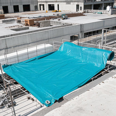 Tarp secured with ropes and grommets
