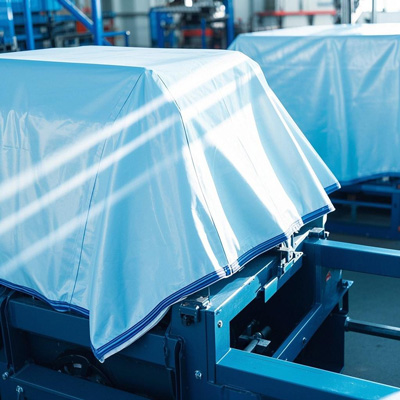 Reinforced corners on industrial machinery cover