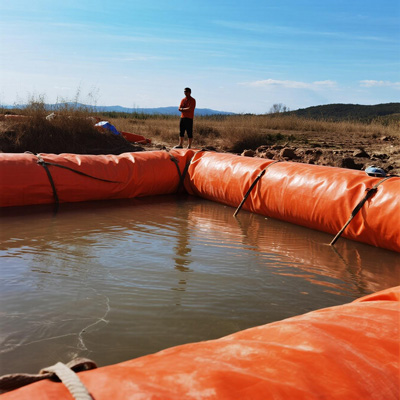 Flood water being contained by PVC barrier