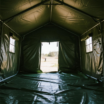 Emergency shelter camp with rows of relief tarps