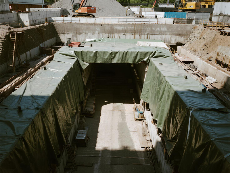 Heavy-duty PVC tarp installed in tunnel construction site