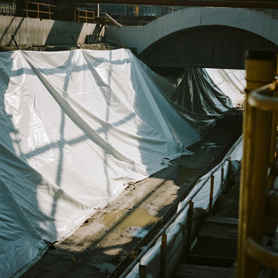 Detail of tarp attachment system in tunnel