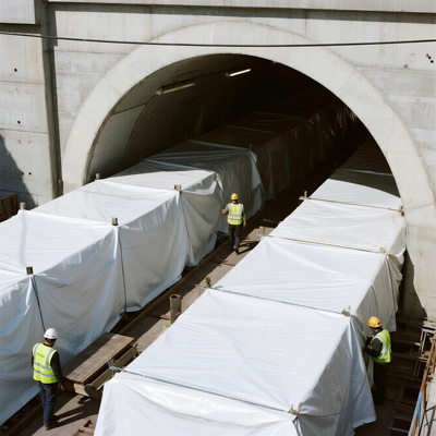 Tunnel work zone separation using construction tarps