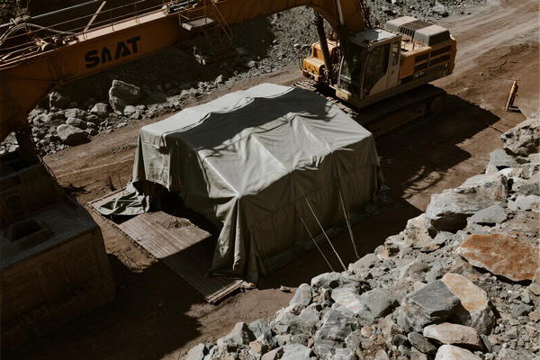 Temporary shelter using mining tarp at mine site