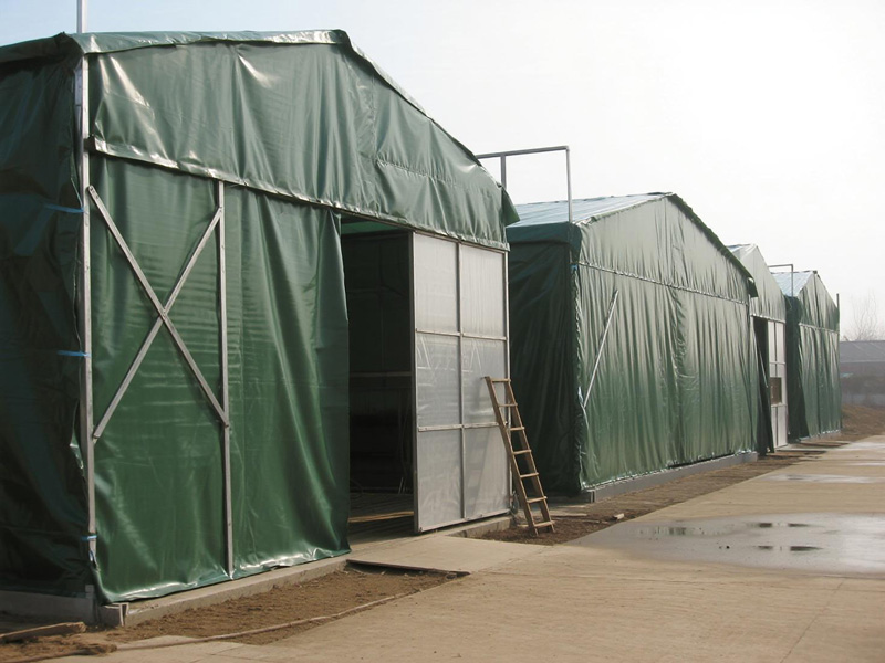 Detail of reinforced edges on livestock shelter tarp