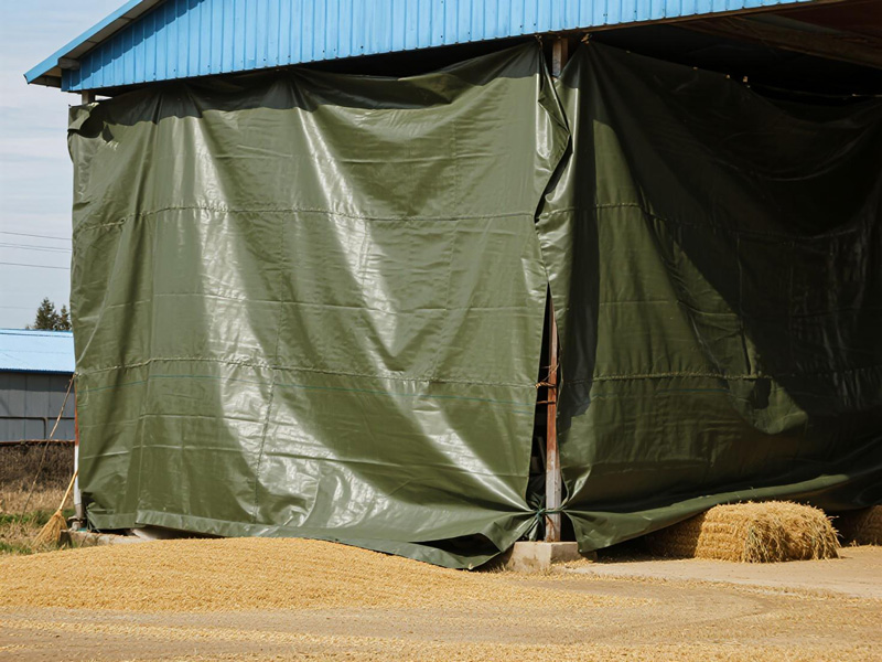 Close-up of reinforced edges on grain storage cover