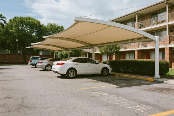 Residential complex parking area with shade structures