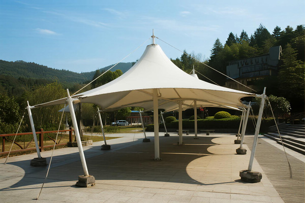 Cultural heritage site with shade structures featuring traditional patterns