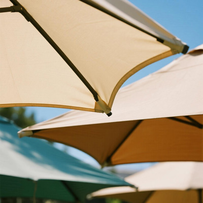 Color gradient shade structure by lake in scenic area