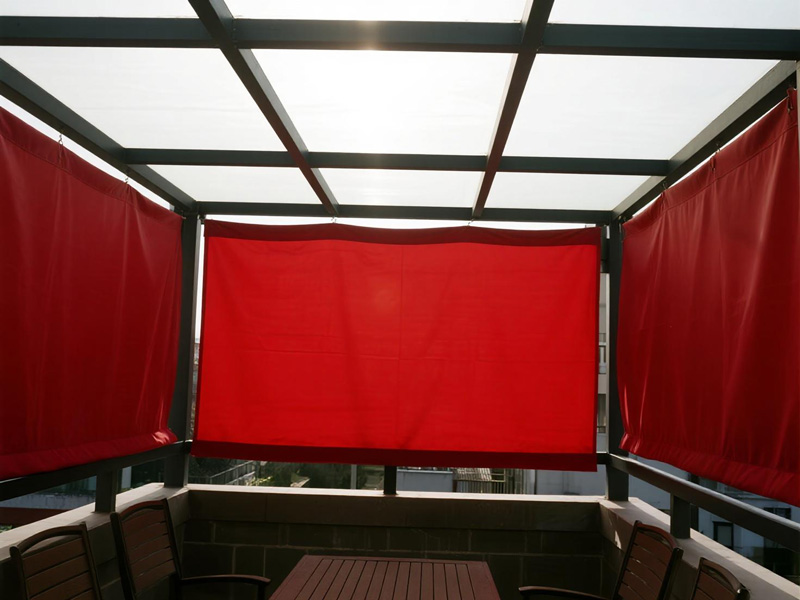 Patio rain curtains retracted to enjoy clear weather