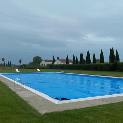 Pool equipment protected by custom rain cover