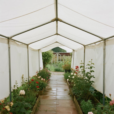Garden path with retractable rain cover