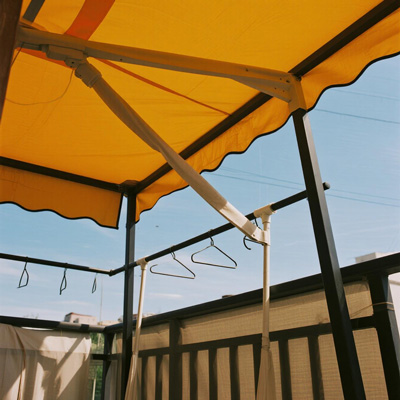 Rain protection provided by balcony cover during downpour