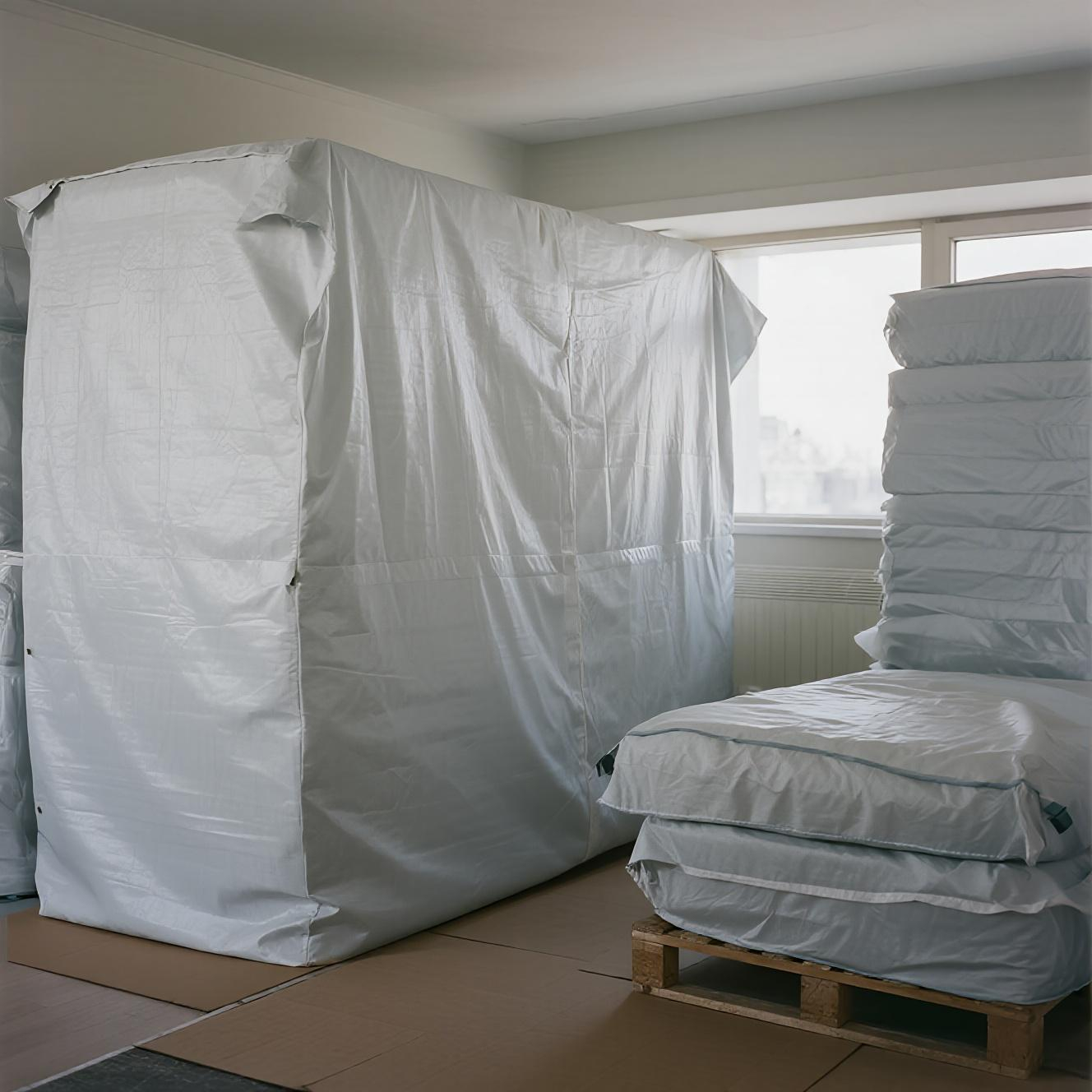 Dust cover protecting sofa during move