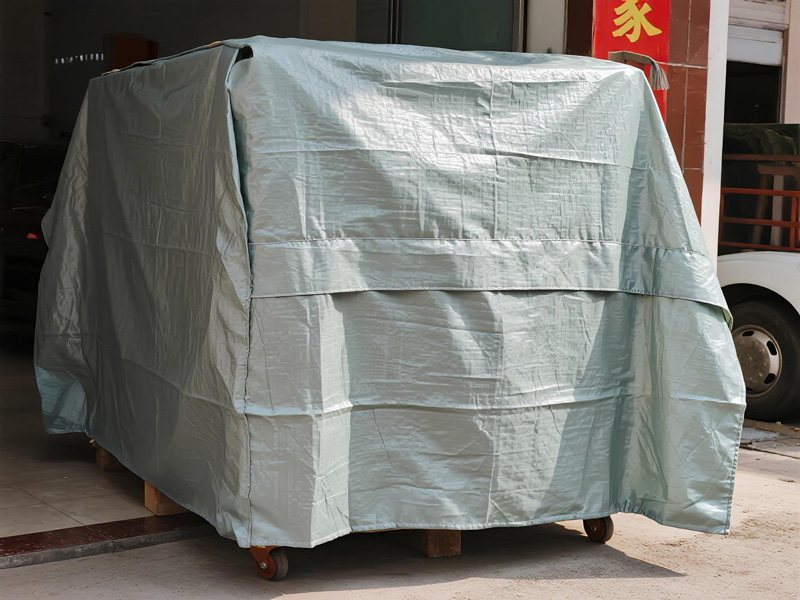 Close-up of PE dust cover material showing thickness and texture