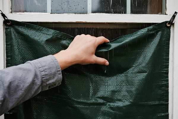 Temporary cover on broken window during hot weather