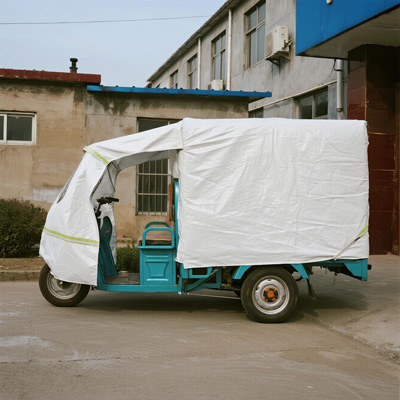 Tarpaulin folded for compact storage when not in use