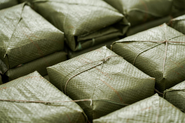 E-commerce packages ready for delivery with rain protection