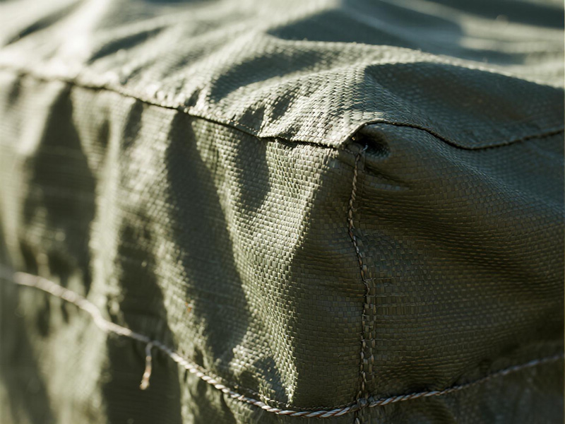 Garden tools storage covered with dust protection cover