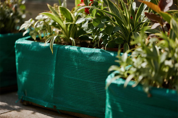 Window boxes with rain protection covers