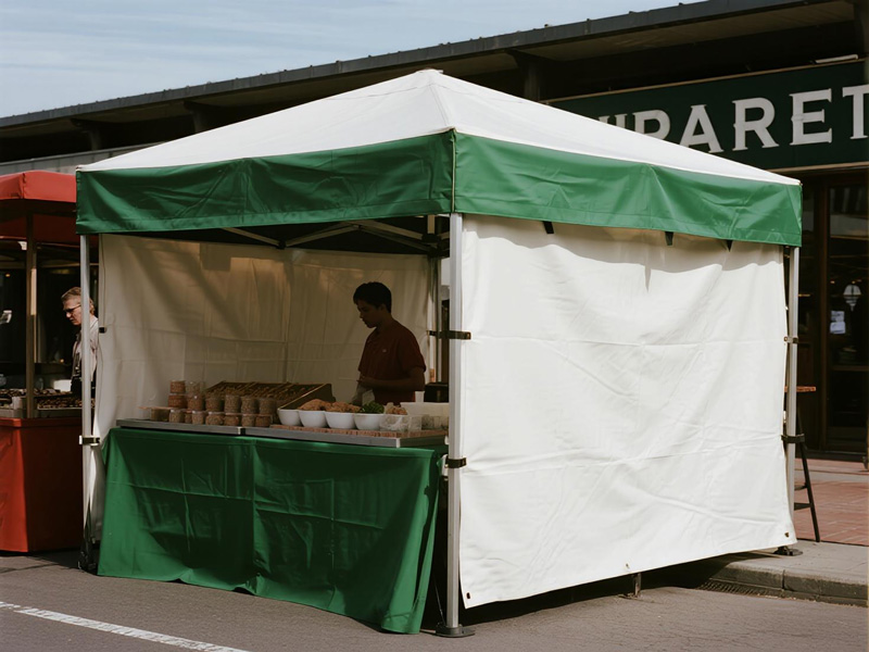 Tarp secured to market stall frame