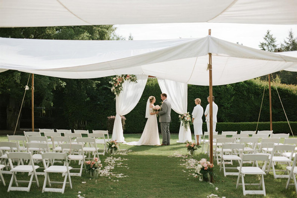 Garden wedding with temporary cover