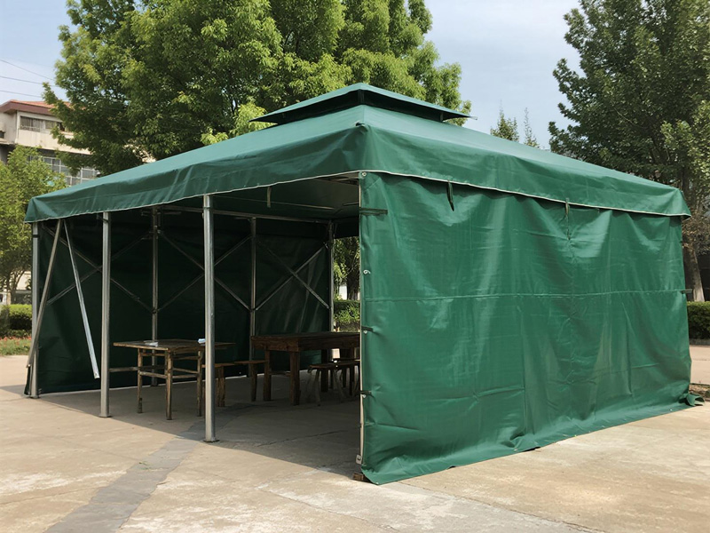 Close-up of BBQ cover material showing reinforced weave and heat-resistant properties
