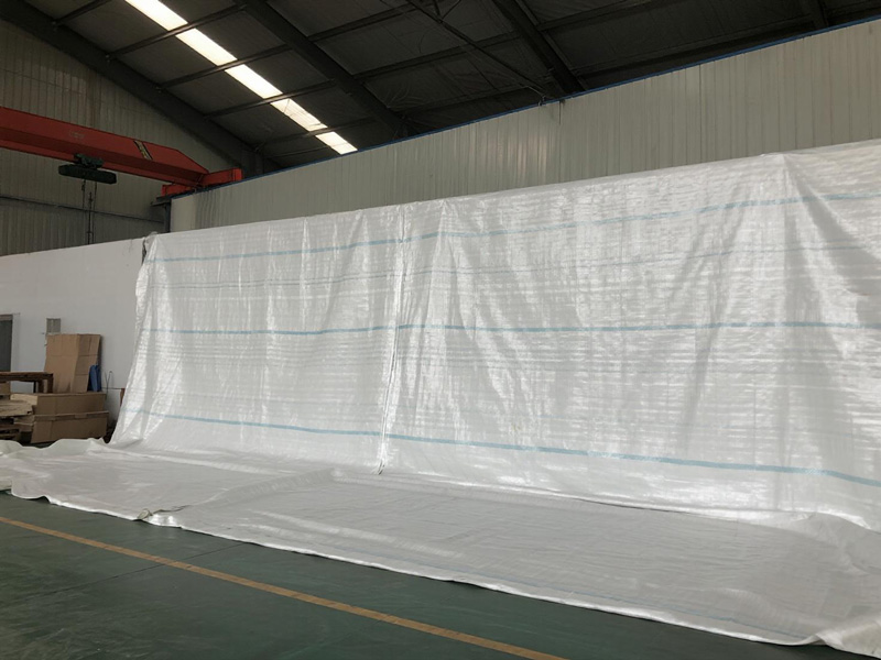 Close-up of tarp material showing waterproof construction