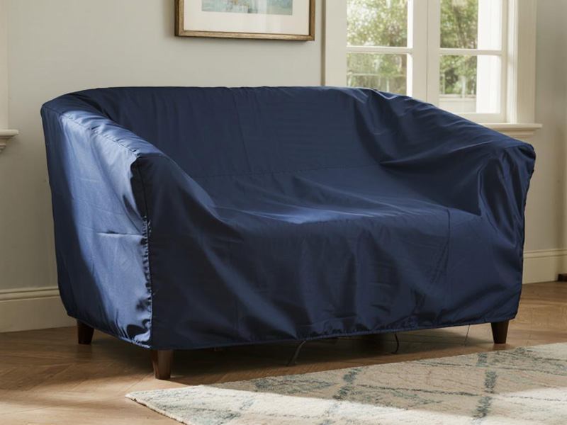 Sofa cover showing secure fit and elastic edges