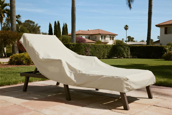 Covered outdoor sofa and lounge chairs