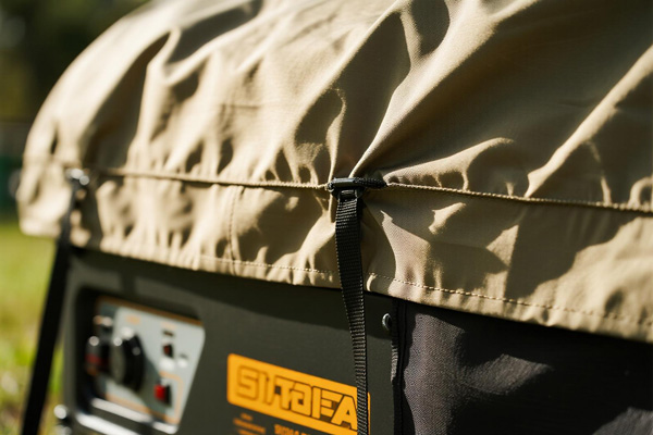 Oxford fabric generator cover protecting a generator from weather elements