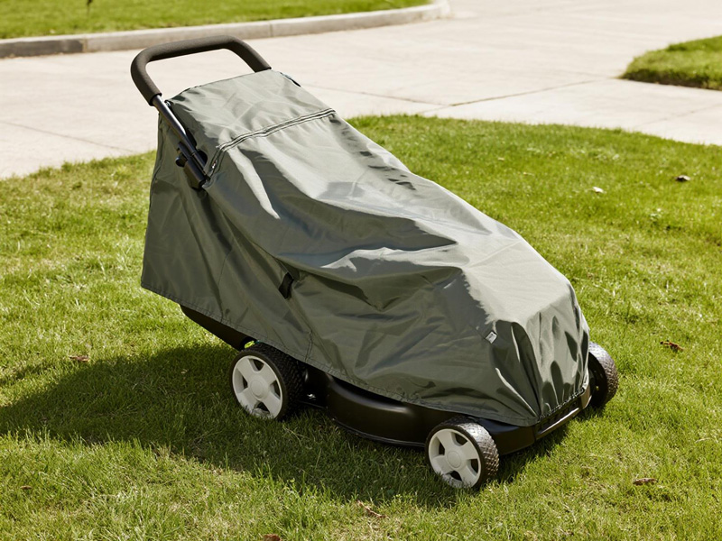 Multiple garden tools covered with protective covers