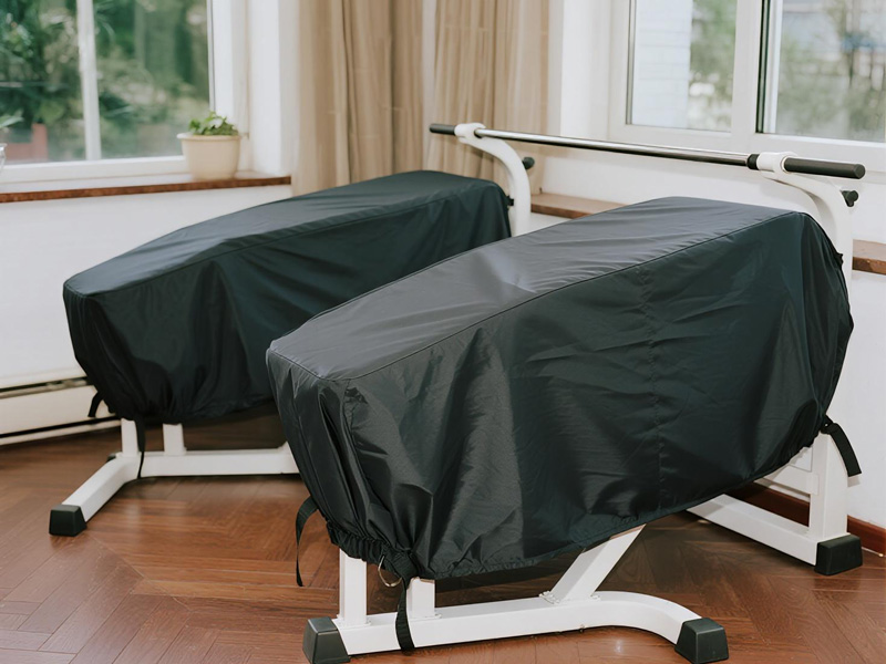Close-up of Oxford fabric fitness equipment cover showing durable construction