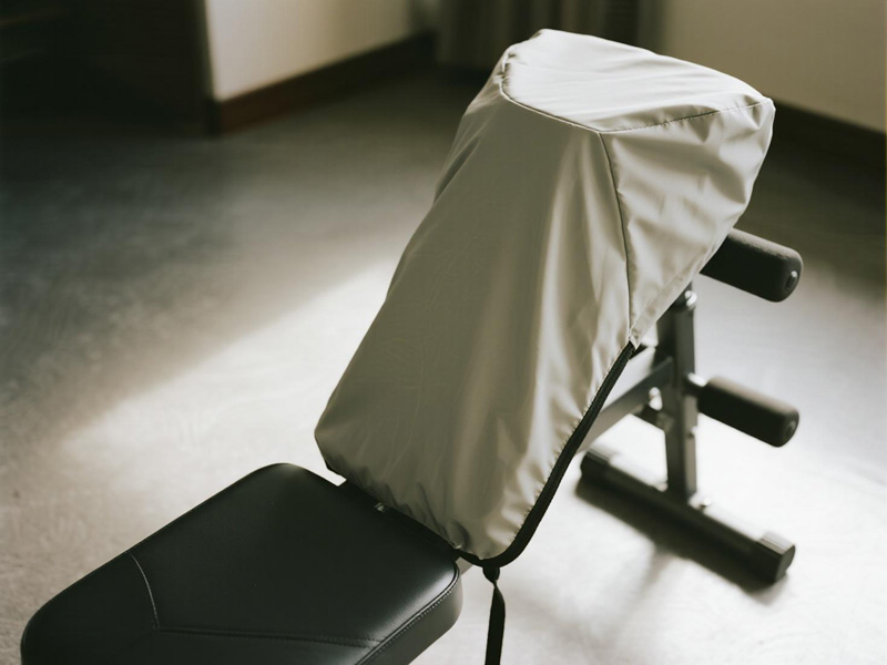 Fitness equipment cover showing secure fit and design features