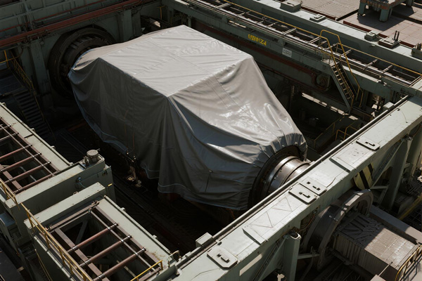 Heavy industrial machinery with dust cover