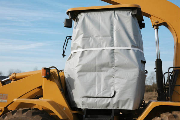 Bulldozer with protective storage cover