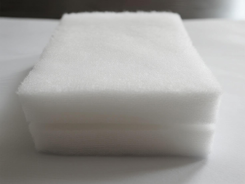 Close-up view of woven polyester filter cloth showing precise construction