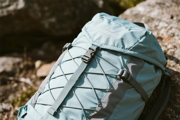 Travel backpack using durable lightweight fabric in urban setting