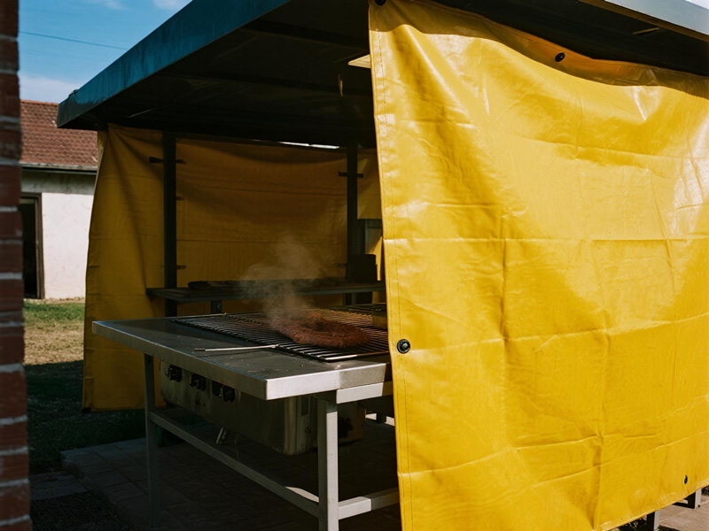 Close-up of fireproof BBQ mat showing durable construction and heat-resistant coating
