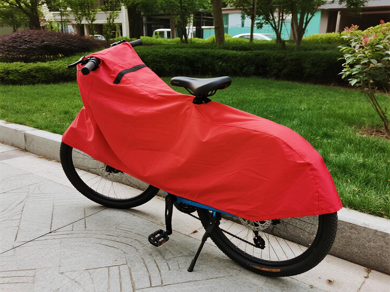 Compact folded bike cover in storage bag