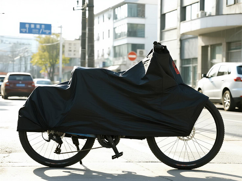 Various sizes of bike covers displayed with different vehicles
